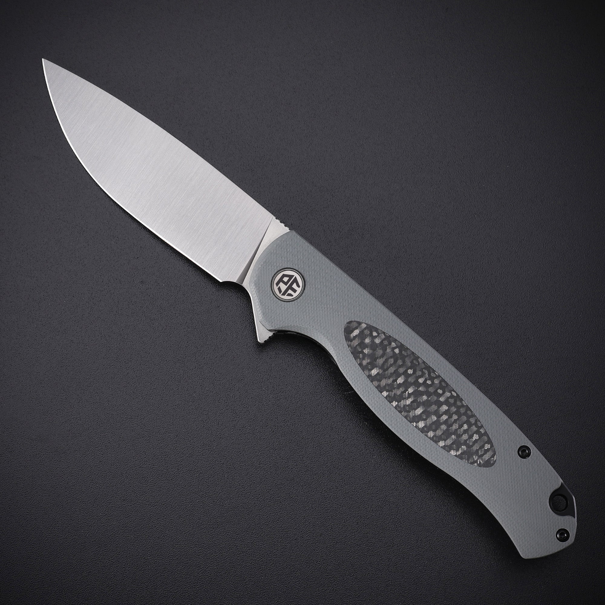 Petrified Fish PFB03 Stamp,3.58" D2 Blade,136g G10&Carbon Fiber Handle Flipper Liner Lock Folding Knife