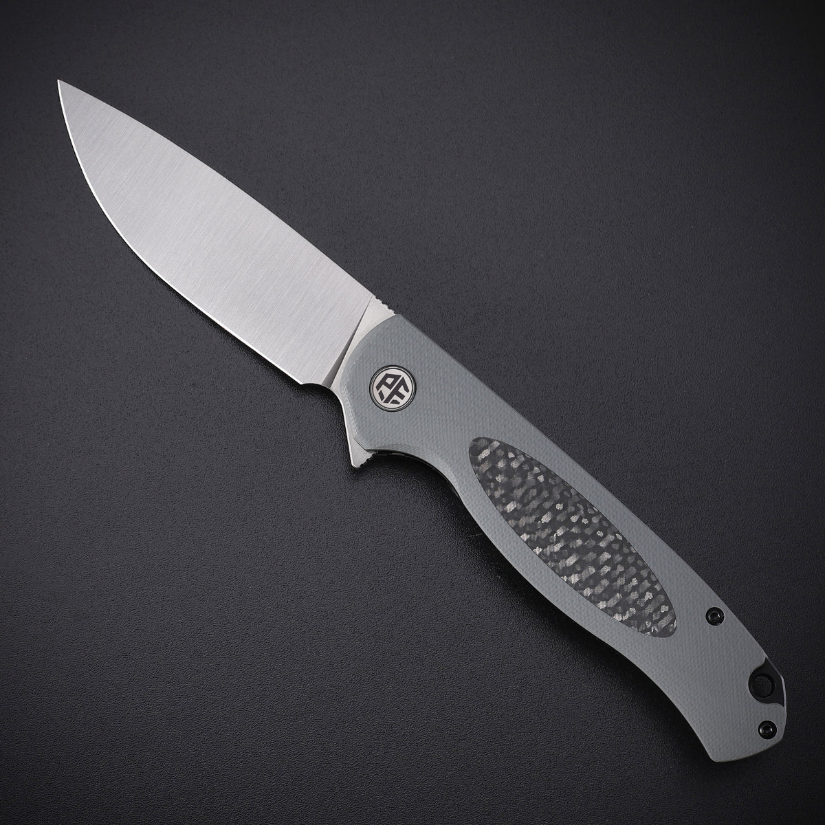 Petrified Fish PFB03 Stamp,3.58" D2 Blade,136g G10&Carbon Fiber Handle Flipper Liner Lock Folding Knife
